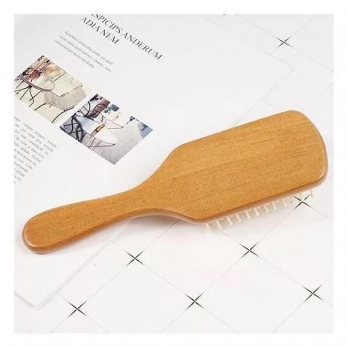 Peigne en bois pour le soin des cheveux
